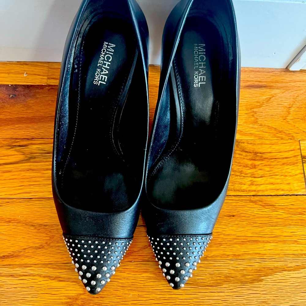 Metal accentuated pair of Michael Kors stilettos